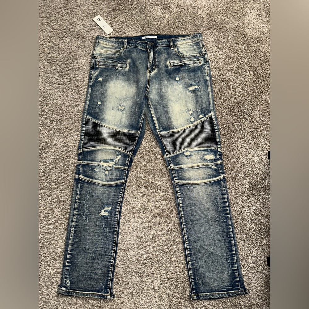 Men's Distressed Blue Jeans brand new with tags this style is sold out on websi